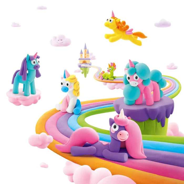 Vibrant clay unicorn figures in various colors on a winding rainbow road with pink clouds and a floating castle.