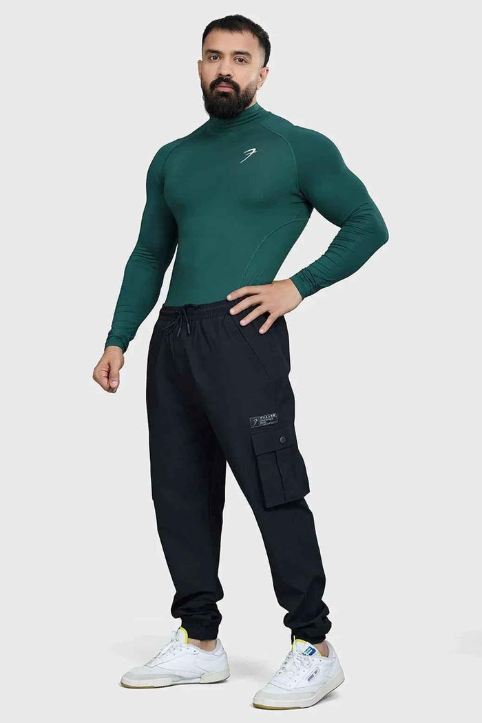 Emerald high neck compression full sleeves T-shirt by Fuaark NZ, showcasing a fitted athletic design and smooth fabric.