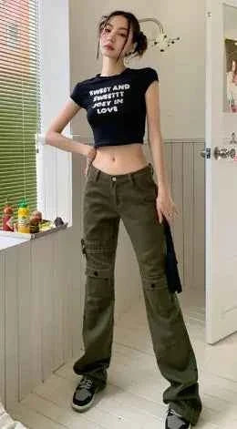 Dark green High Street Cargo Straight Pants and Jeans for women by Mead's Supply & Equipment Outfitters, featuring a relaxed fit and cargo pockets.