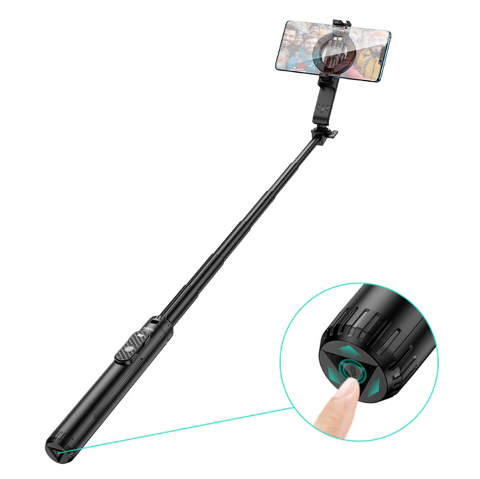 Techplus Hoco Bluetooth selfie stick with 1.5m tripod and magnetic phone holder, shown with smartphone attached for selfies.