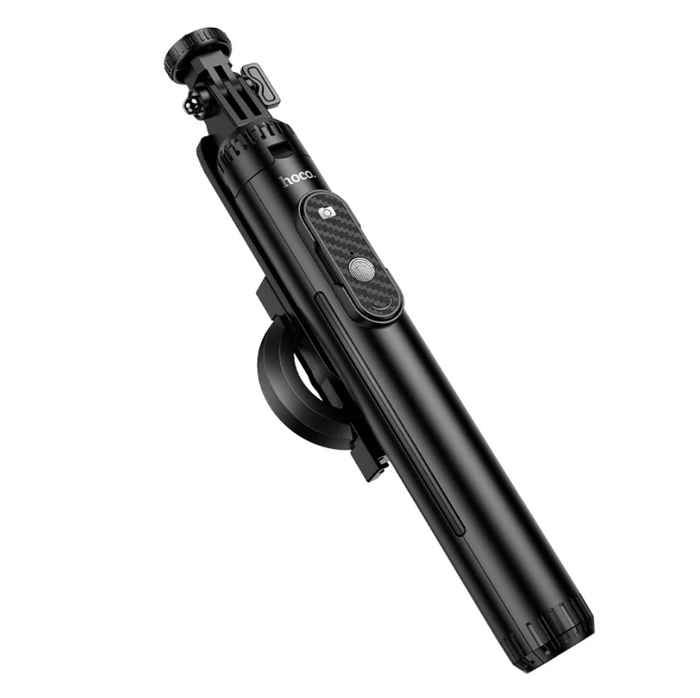 Techplus Hoco Bluetooth selfie stick with 1.5m tripod and magnetic phone holder, shown holding a smartphone for selfies.