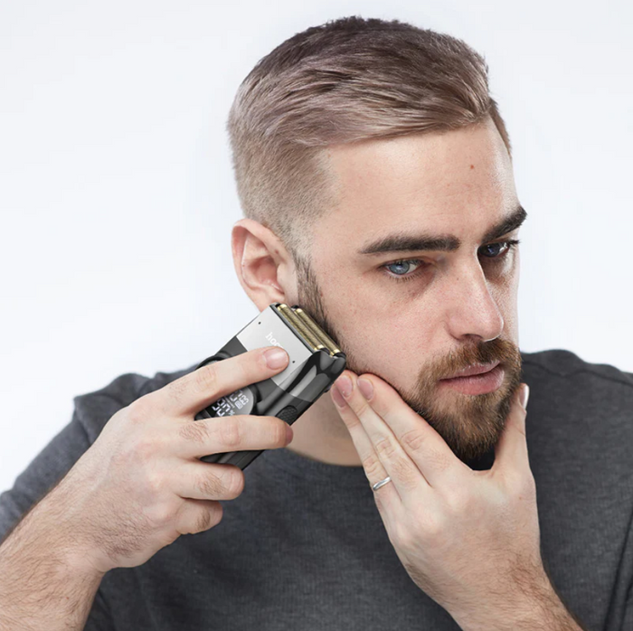 Techplus Hoco electric hair shaver and trimmer with dual mesh display, showing sleek design and trimming attachments.