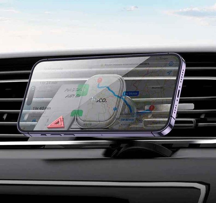 Techplus Hoco H29 magnetic air vent phone holder with strong N45 magnet mount, securely holding a mobile phone on a car air vent.
