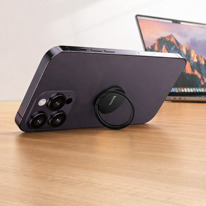 Techplus Hoco metallic foldable ring phone grip stand in black, showcasing its 360° rotating ring on a smartphone.
