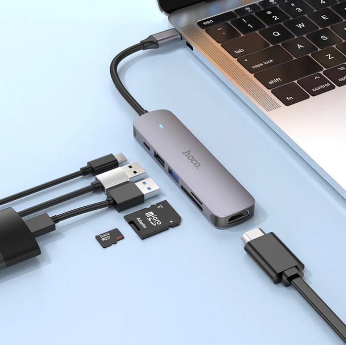 Techplus Hoco PD 100W USB-C 6-in-1 Adapter Hub with multiple ports and sleek design for versatile connectivity.