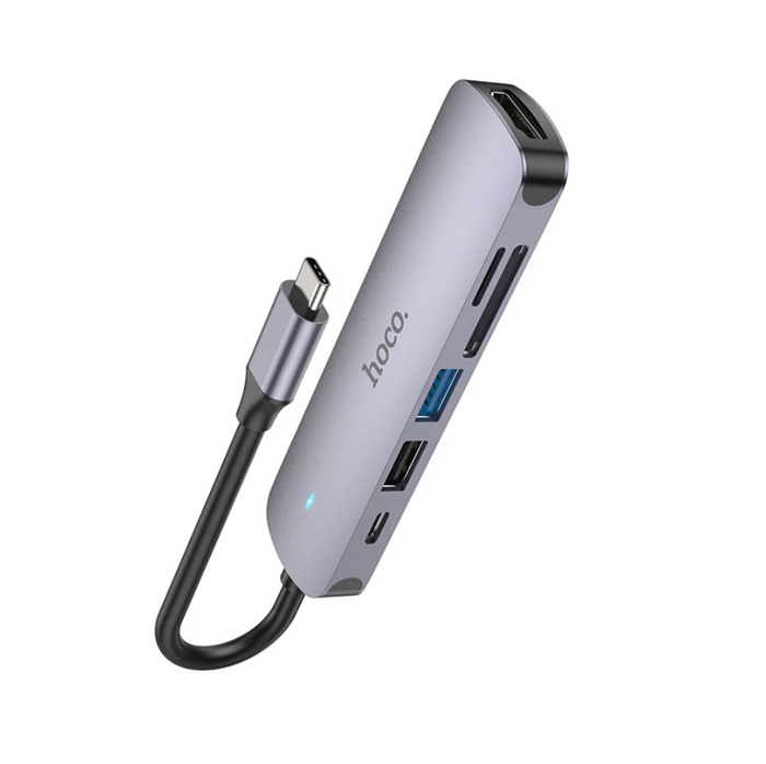 Techplus Hoco PD 100W USB-C 6-in-1 Adapter Hub showing multiple ports including USB-C, HDMI, and USB-A for versatile connectivity.