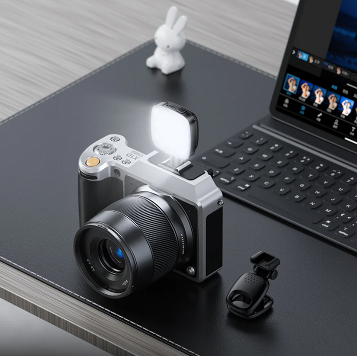 Techplus Hoco portable mini LED fill light with 9 adjustable levels, clip-on design for enhanced lighting in photos and videos.