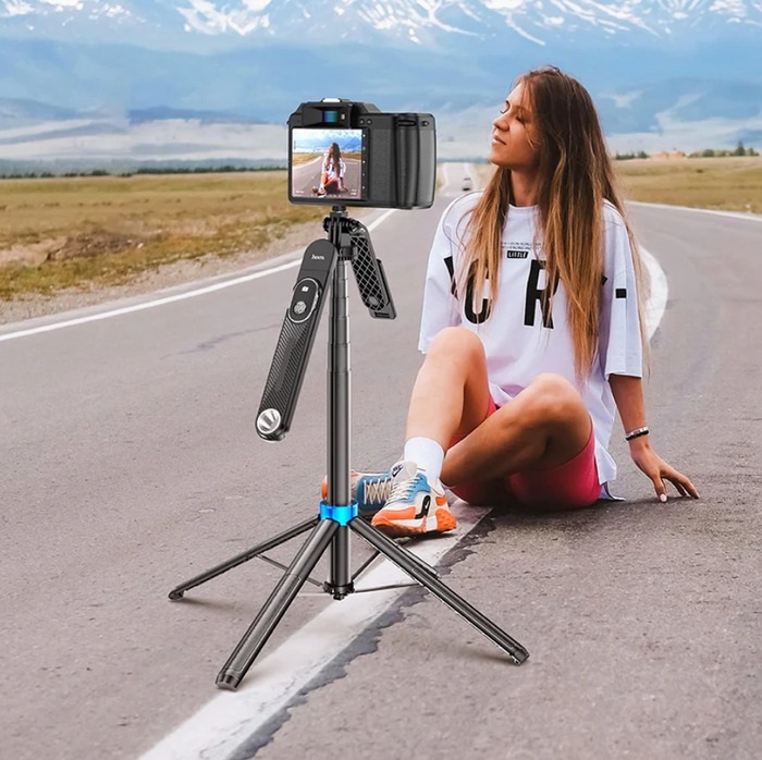 Techplus Hoco Premium Bluetooth Selfie Stick with 1.75m extendable quadpod stand, shown fully extended with smartphone holder