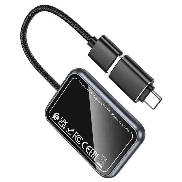 TechPlus Hoco Wireless CarPlay Adapter USB-A to USB-C converter connected to a car dashboard for seamless device integration.