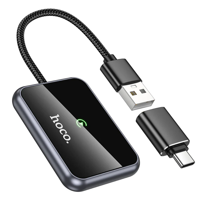 Techplus Hoco Wireless CarPlay Adapter USB-A to USB-C converter connected to a car dashboard, enabling wireless CarPlay functionality.