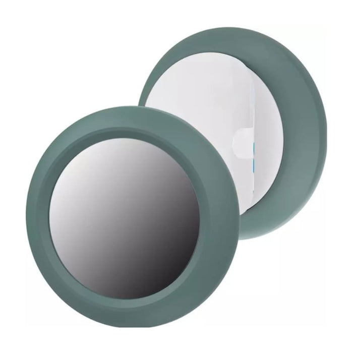 Black and green holder for Apple Air Tag, designed by That Watch Shop, shown attached to a keychain or item for tracking.