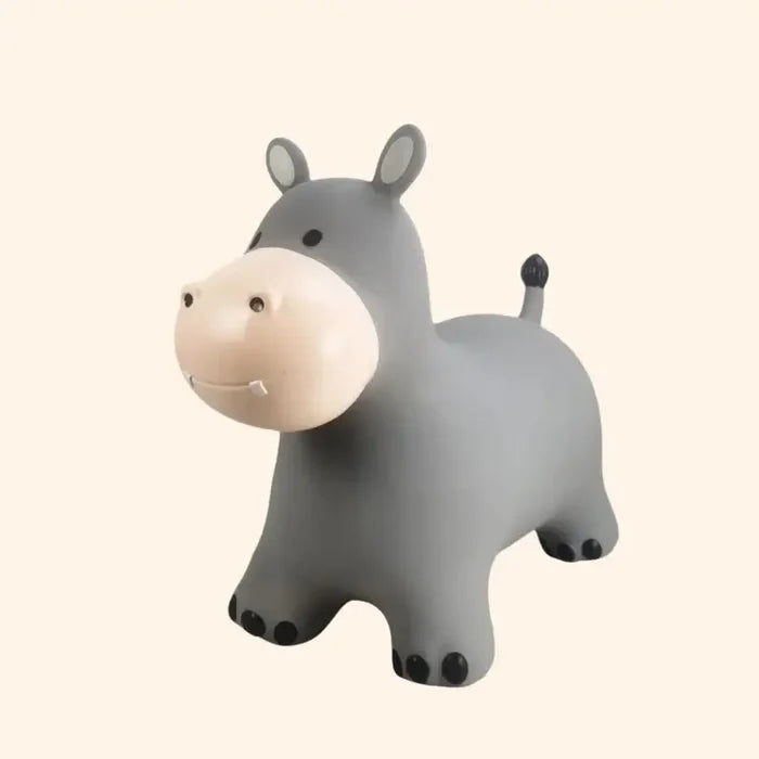 Gray inflatable hippo hopper toy with a cream snout, small black eyes, and black toes on four short legs.