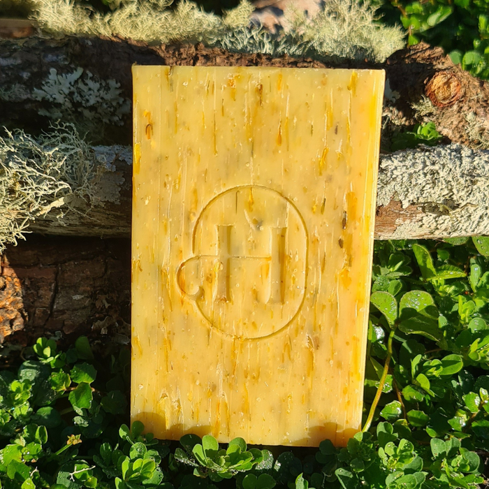 Holistic Hound Grooming Bar 120g by Animal Addiction Limited, natural grooming soap with a rustic appearance and textured surface.