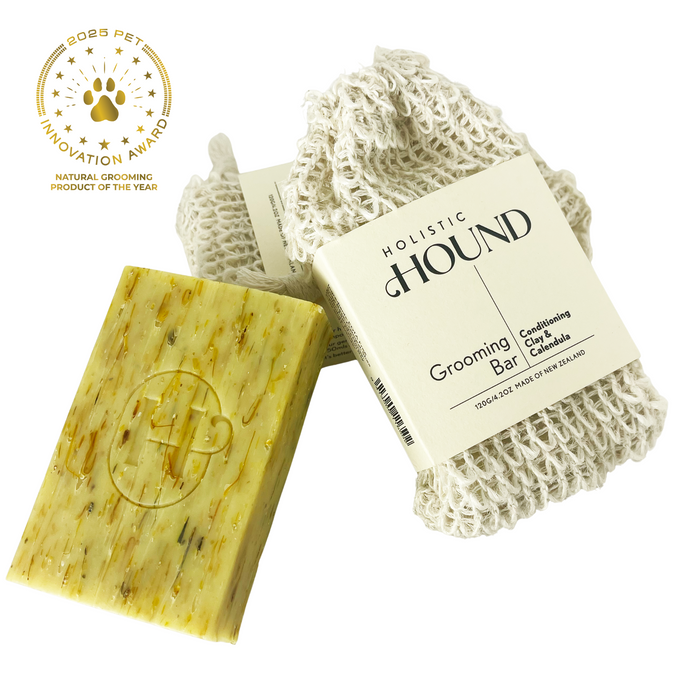 Holistic Hound Grooming Bar 120g by Animal Addiction Limited, natural soap bar with a textured, earthy appearance for pet grooming.