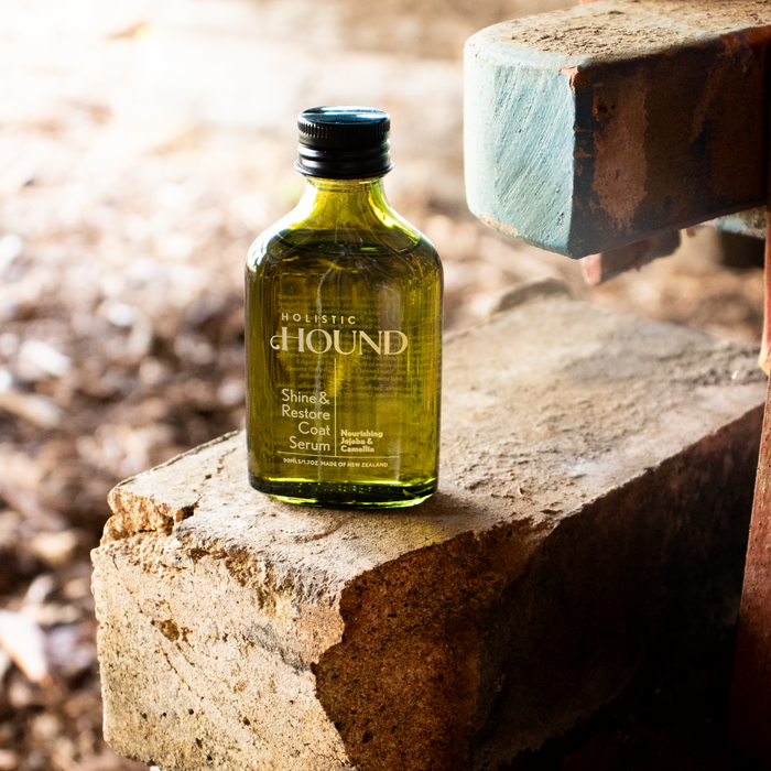 Holistic Hound Shine & Restore Coat Serum by Animal Addiction Limited in a 50ml bottle, designed to enhance and restore pet coats.