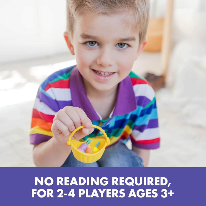 Smiling boy holds a small yellow basket with colorful toy carrots. Text: No reading required, ages 3+.