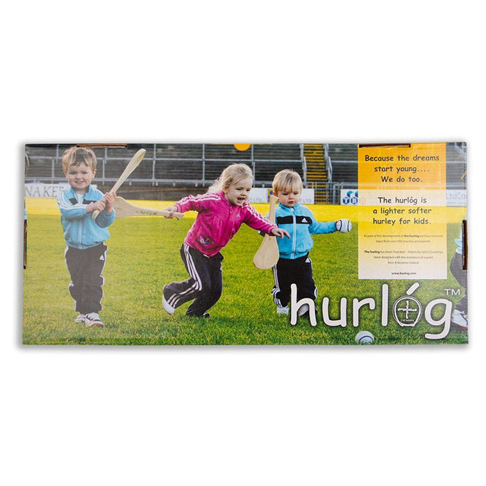 Box for Hurlóg soft hurley showing young children playing with foam hurling sticks on a grass sports field.
