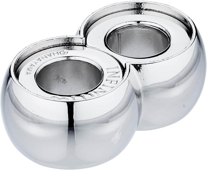 Polished chrome infinity-shaped metal puzzle with two hollow spherical sections and a reflective finish.