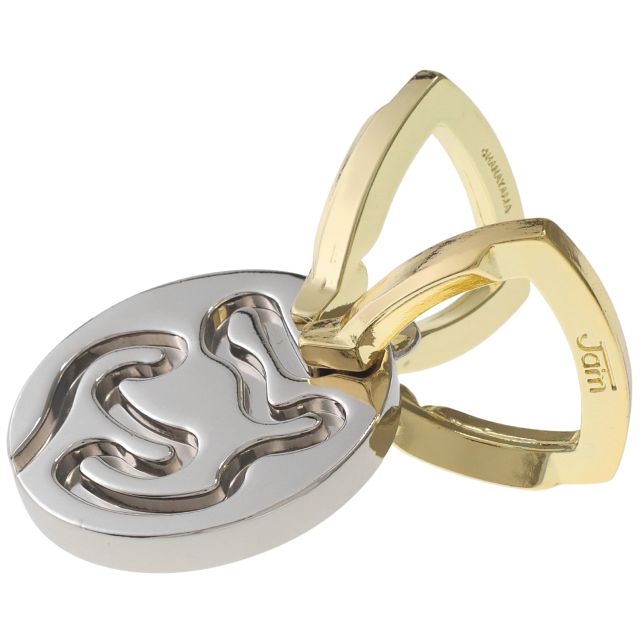 Silver oval metal disk with maze-like grooves interlocked with two gold-colored triangular rings.