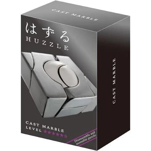 Silver metallic puzzle with four interlocking pieces around a central marble, pictured on black product packaging.