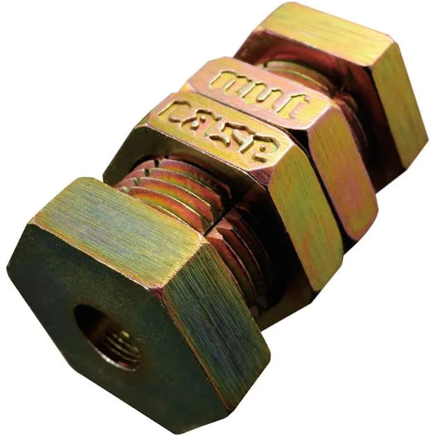Gold-toned metal puzzle consisting of interlocked hexagonal bolts and nuts with embossed Nut and Case lettering.