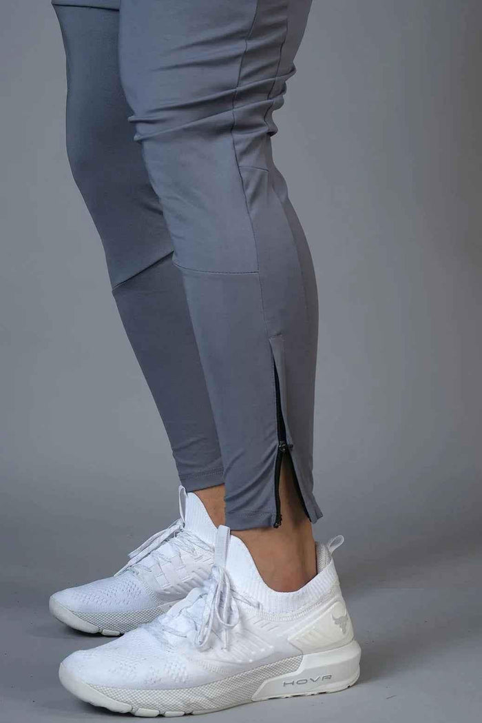 Fuaark Nz hybrid slim track shoes designed for enhanced performance and stylish athletic wear, shown with sleek black design.