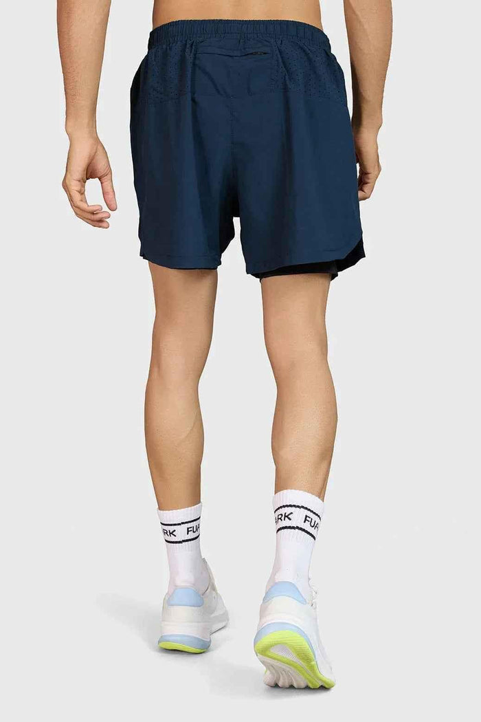 Fuaark Nz Hyper 5-inch navy running shorts, lightweight and comfortable athletic wear, shown on a model for active sports.