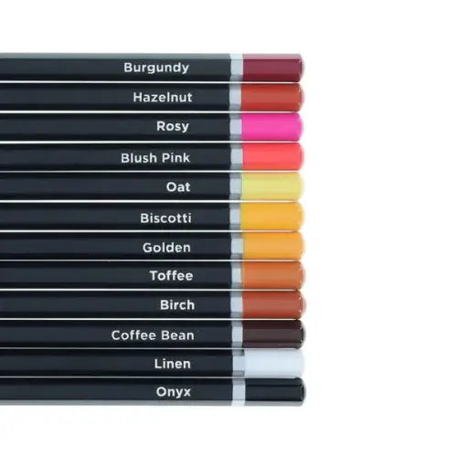 Twelve black hexagonal pencils with colored tips and shade names like Burgundy and Oat labeled on the barrels.