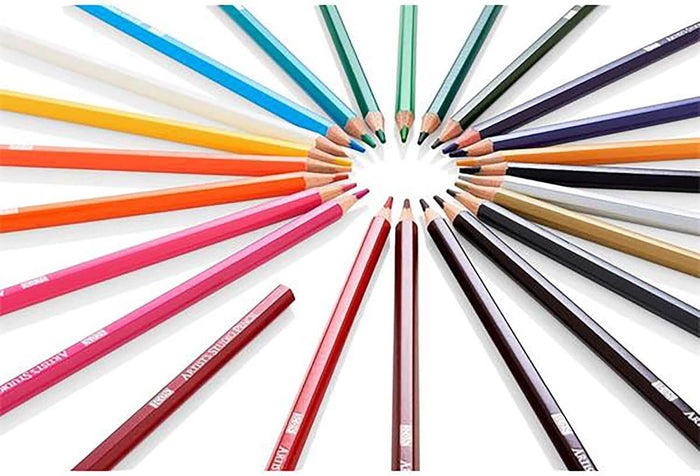 24 vibrant colored pencils in a circular sunburst arrangement with sharpened tips pointing inward on white.