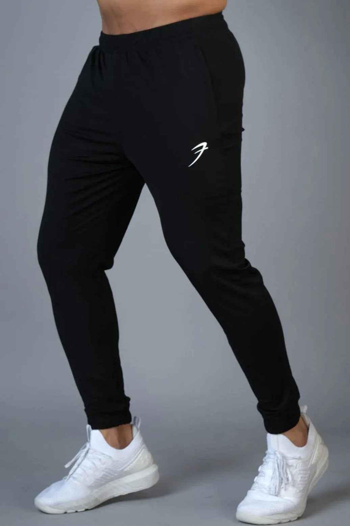 Black Fuaark Nz Identity Nylon Joggers, stylish and comfortable men's joggers with a sleek design and durable nylon fabric.