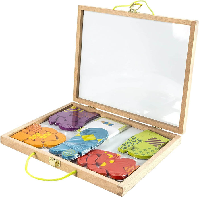 Open wooden case with colorful magnetic shapes, pattern cards, a whiteboard lid, and a neon green rope handle.