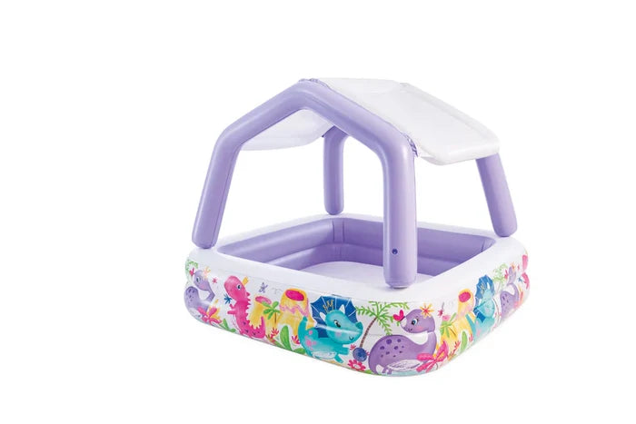Purple square inflatable pool with white sunshade canopy and colorful cartoon dinosaur graphics around the base.