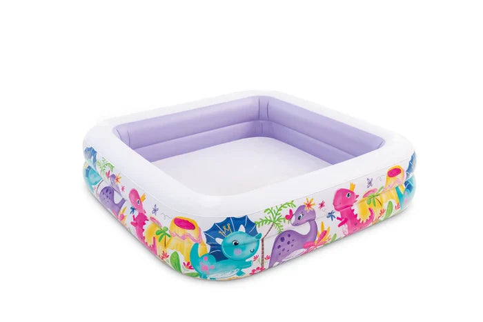 Square inflatable pool with purple interior and colorful cartoon dinosaur illustrations on the white exterior.