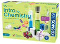 Lime green box with foaming test tubes, grapes, and a bottle of mineral water. Text reads Intro to Chemistry, ages 8-12.