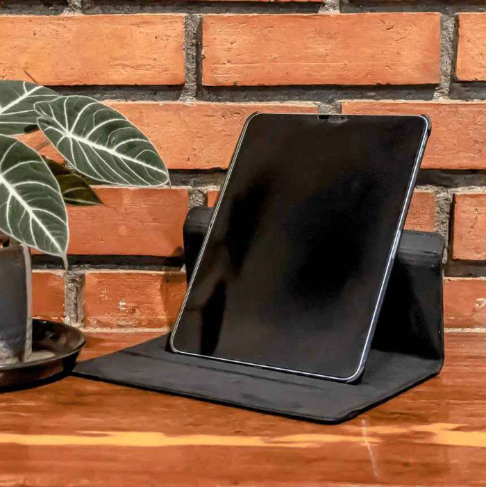 Techplus iPad Air 2 rotating case with 360° protective cover, showing the sleek design and adjustable stand functionality.