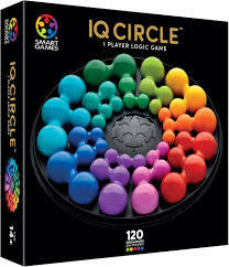 Black game box showing a circular board with colorful, interconnected rounded pieces arranged in a rainbow spectrum.