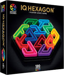 Black box for IQ Hexagon logic game showing colorful interlocking plastic pieces in a hexagonal tray.