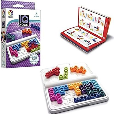 Colorful X and O shaped puzzle pieces in a white tray, red challenge booklet, and purple product box.