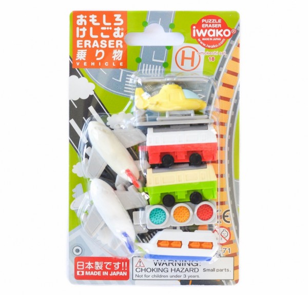 Iwako vehicle puzzle erasers: yellow helicopter, red and green trains, traffic light, boat, and planes in a blister pack.