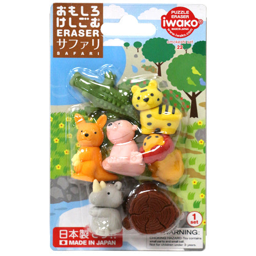 Colorful Japanese animal erasers in a safari-themed pack: crocodile, tiger, kangaroo, hippo, rhino, and a tree stump.