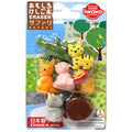 Colorful Japanese animal erasers in a safari-themed pack: crocodile, tiger, kangaroo, hippo, rhino, and a tree stump.