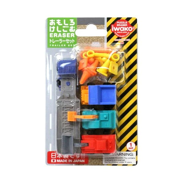 Iwako construction puzzle erasers in a blister pack: gray trailer, blue truck, teal excavator, red steamroller, and cones.
