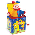 Plush jester popping out of a colorful circus-themed tin box with a red crank handle and white star pattern.