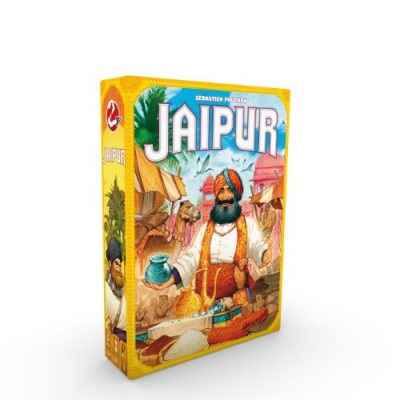 Yellow rectangular board game box with a vibrant illustration of a turbaned merchant at a marketplace with camels.