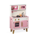 Pink and white wooden play kitchen with oven, stovetop, sink, microwave, gold handles, and polka dot backsplash.