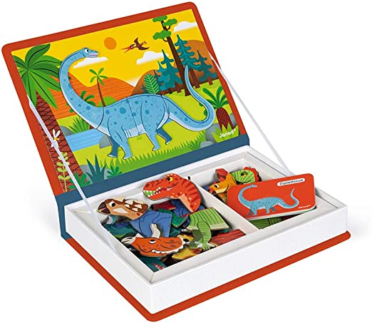 Open book-shaped toy box with a dinosaur magnet scene on the lid and colorful magnetic pieces inside.