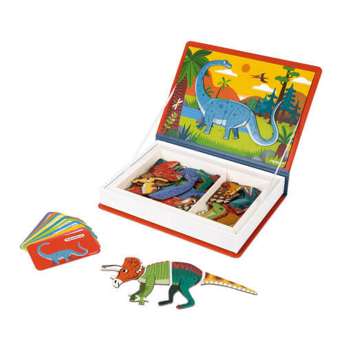 Book-shaped toy box with magnetic dinosaur scene, colorful puzzle pieces, and matching cards on white.