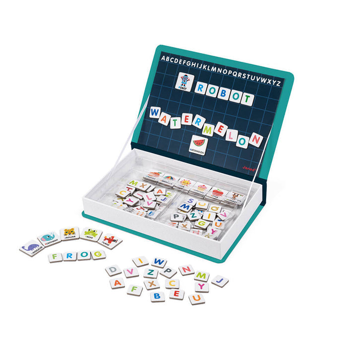 Open teal magnetic toy book with letter and picture tiles spelling words on a grid and scattered in front.