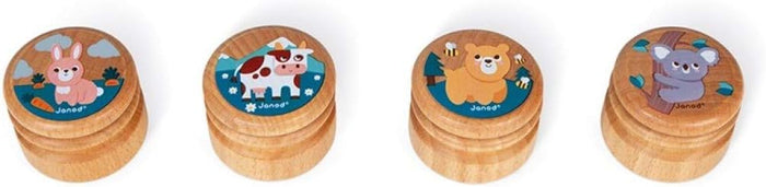 Set of four round wooden boxes featuring colorful illustrations of a rabbit, cow, bear, and koala on the lids.