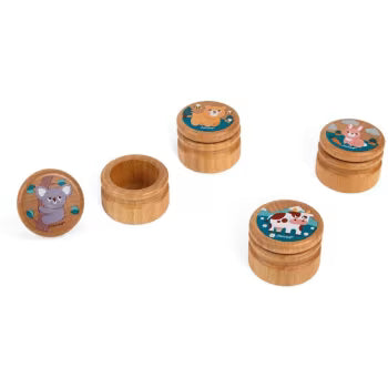 Small cylindrical wooden boxes with illustrated lids featuring a koala, bear, cow, and bunny; one is open.